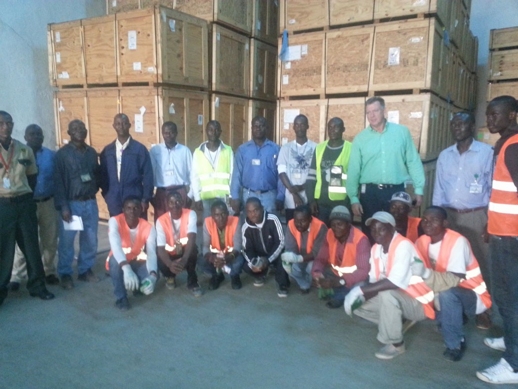 a-fitzgibbon-w-warehouse-crew-in-liberia
